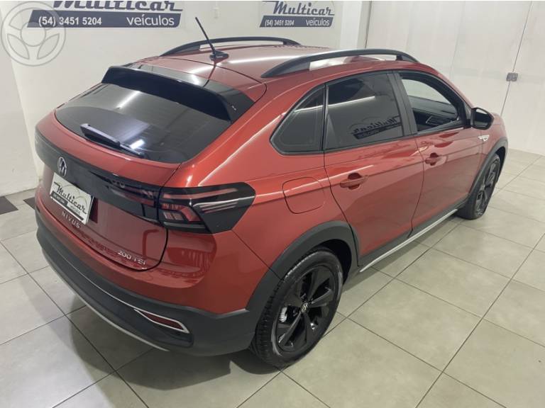 VOLKSWAGEN - NIVUS 1.0 TSI HIGHLINE FLEX 4P AUTOMÁTICO - 2022/2023 - VERMELHA - R$ 119.900,00